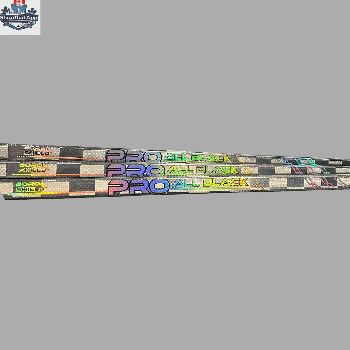 Close-up of LabSports Pro All Black V2 hockey stick shaft showing carbon construction and sleek black design.