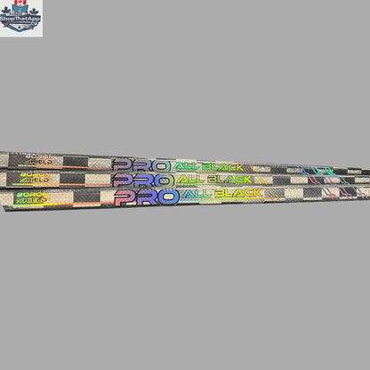 Close-up of LabSports Pro All Black V2 hockey stick shaft showing carbon construction and sleek black design.