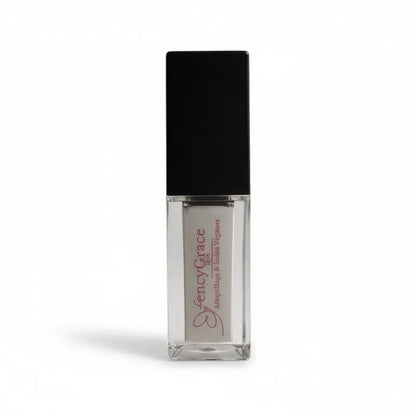 Vegan FencyGrace Fruit Repulpant Lip Oil in a clear tube with a brush applicator, showing fresh fruit ingredients for lip care.