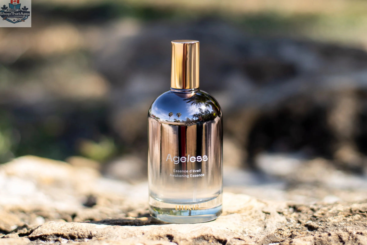 LILIXIR Ageless Awakening Essence mist in a clear bottle with a spray top, designed for skincare and skin rejuvenation.