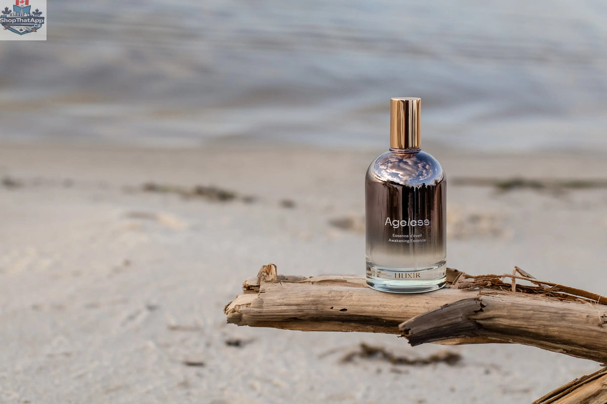 LILIXIR Ageless Awakening Essence mist in a clear spray bottle with a minimalist label, ready for skincare application.