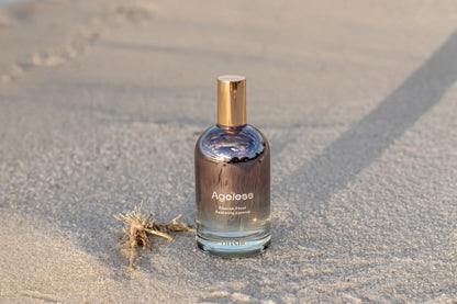 LILIXIR Ageless Awakening Essence mist bottle with a sleek design, ready to hydrate and rejuvenate skin.