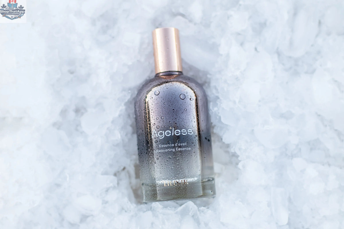 LILIXIR Ageless Awakening Essence mist in a clear spray bottle, designed to hydrate and rejuvenate skin with a refreshing spray