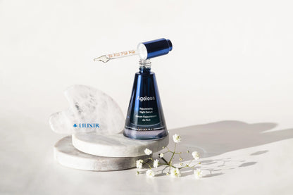 LILIXIR Ageless Rejuvenating Night Serum in a sleek glass bottle, showing the serum's smooth, luxurious texture and elegant packaging.