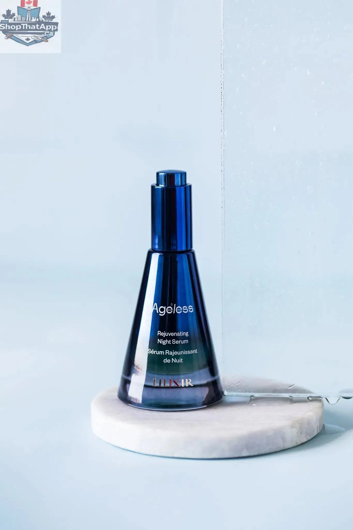 LILIXIR Ageless Rejuvenating Night Serum in a sleek bottle, showcasing the serum's smooth texture and elegant packaging.