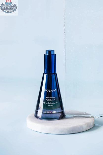 LILIXIR Ageless Rejuvenating Night Serum in a sleek bottle, showcasing the serum's smooth texture and elegant packaging.