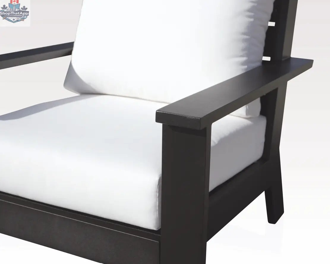 Close-up of Magnolia black aluminum sofa set by Enclover with Sunbrella® cushions, showcasing sleek design and comfortable seating.