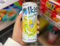 Refreshing Milkis Banana drink in a 250ml bottle by Snack Bar Co, featuring a creamy banana flavor and vibrant beverage label.