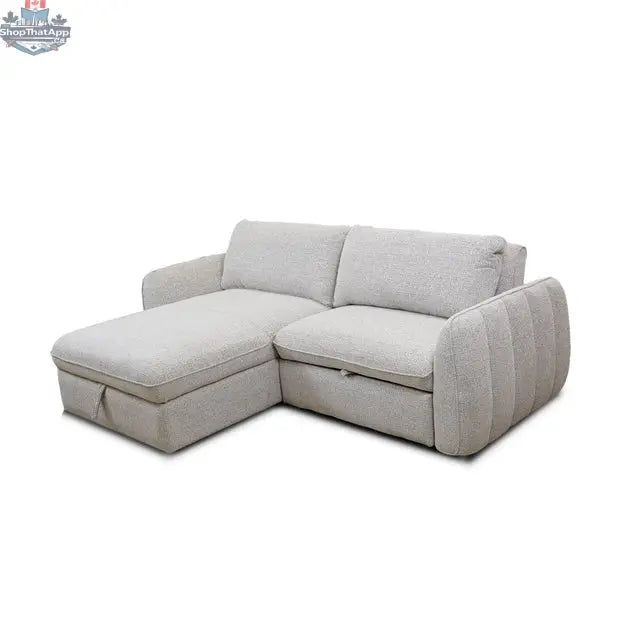 Amira pullout sleeper sectional with storage chaise by Hygge Design House, angled left view showing fabric and storage features.