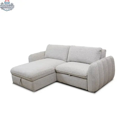 Amira pullout sleeper sectional with storage chaise by Hygge Design House, angled left view showing fabric and storage features.