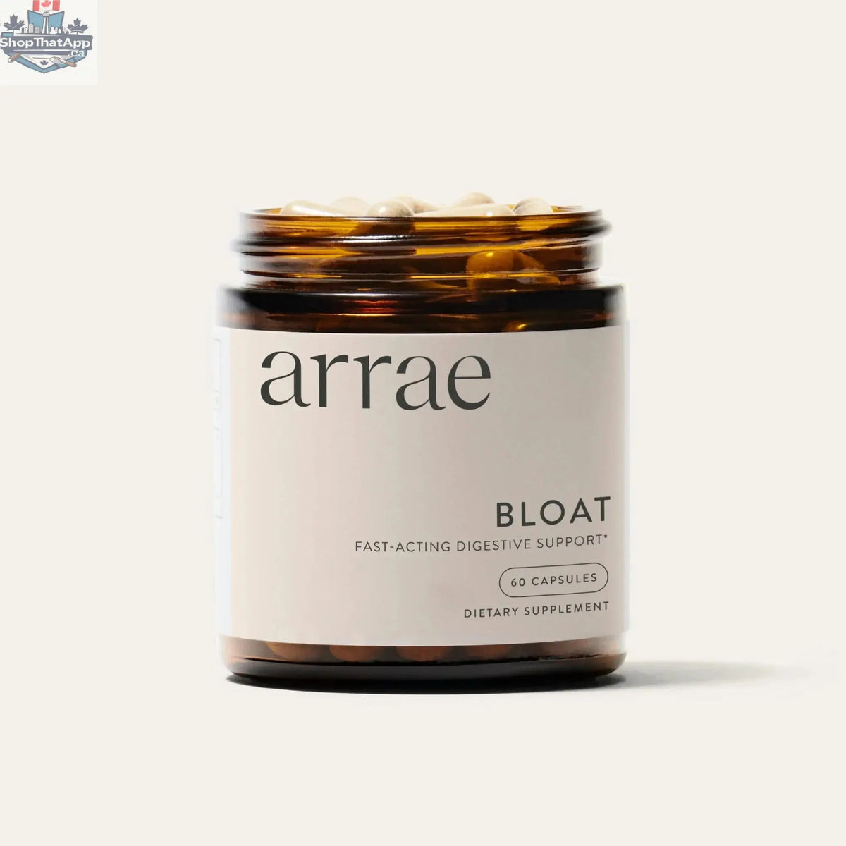 Arrae Bloat Relief supplement by Monarch MD Medical Aesthetics, featuring the product bottle with label and capsules on a clean surface.