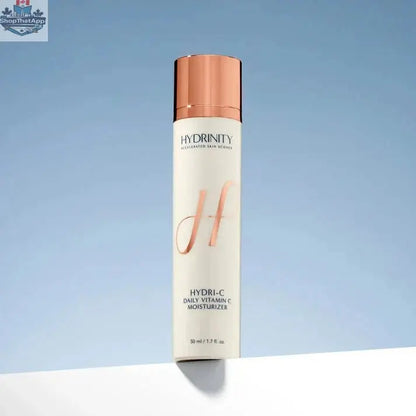 Hydri-C Daily Vitamin C Moisturizer by Monarch MD Medical Aesthetics in a sleek jar with orange accents and a pump dispenser.