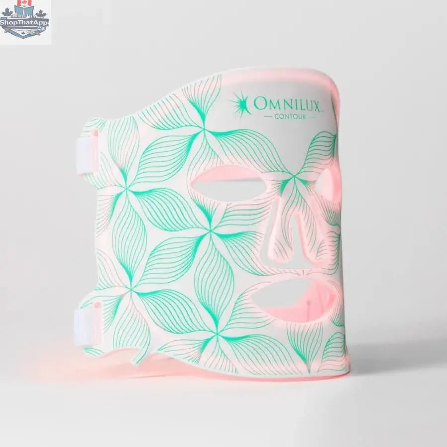 Omnilux Contour Face Therapy device emitting red and infrared light for skin rejuvenation and glowing complexion.