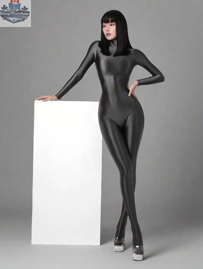 Shiny black MRJCOS spandex nylon bodysuit with back zipper, full jumpsuit design, close-up of smooth, reflective fabric finish.