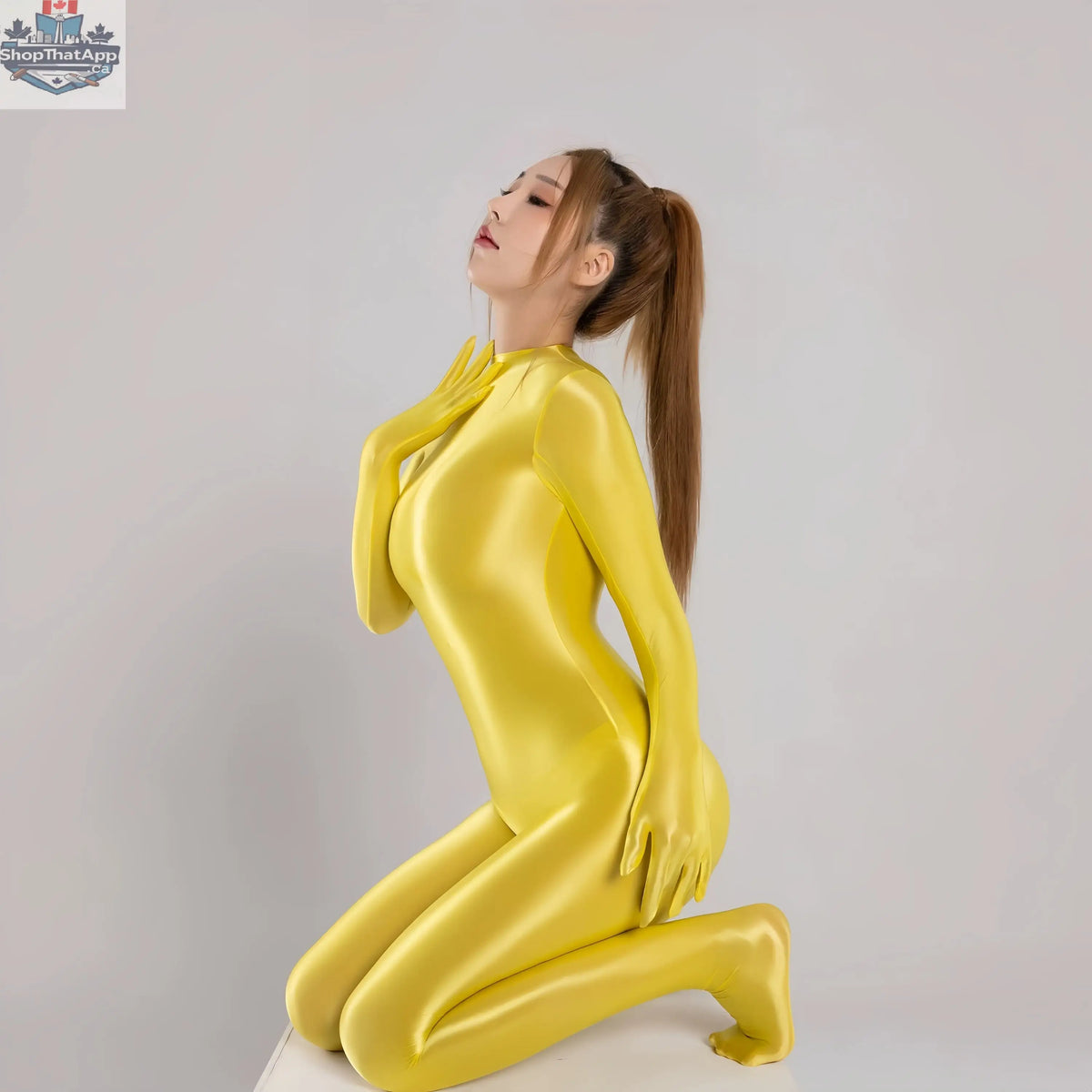 Shiny yellow spandex nylon bodysuit with attached gloves, Zentai cosplay jumpsuit by MRJCOS, full-body costume in the image.