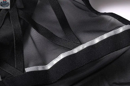 Tactical anime girl cosplay bodysuit with sheer mesh and PU leather details, worn by a model in a MRJCOS costume.