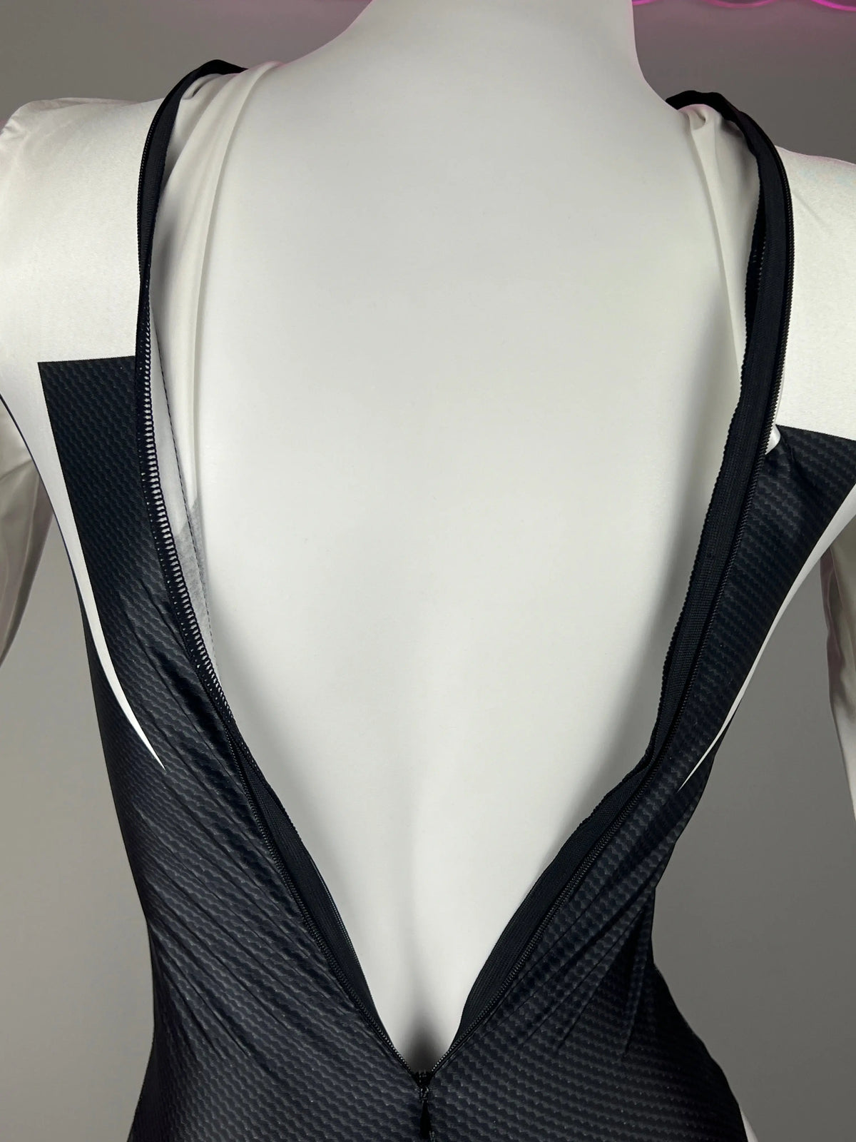 Woman in black spandex superhero bodysuit cosplay costume with full Zentai design, ideal for Halloween or cosplay events.