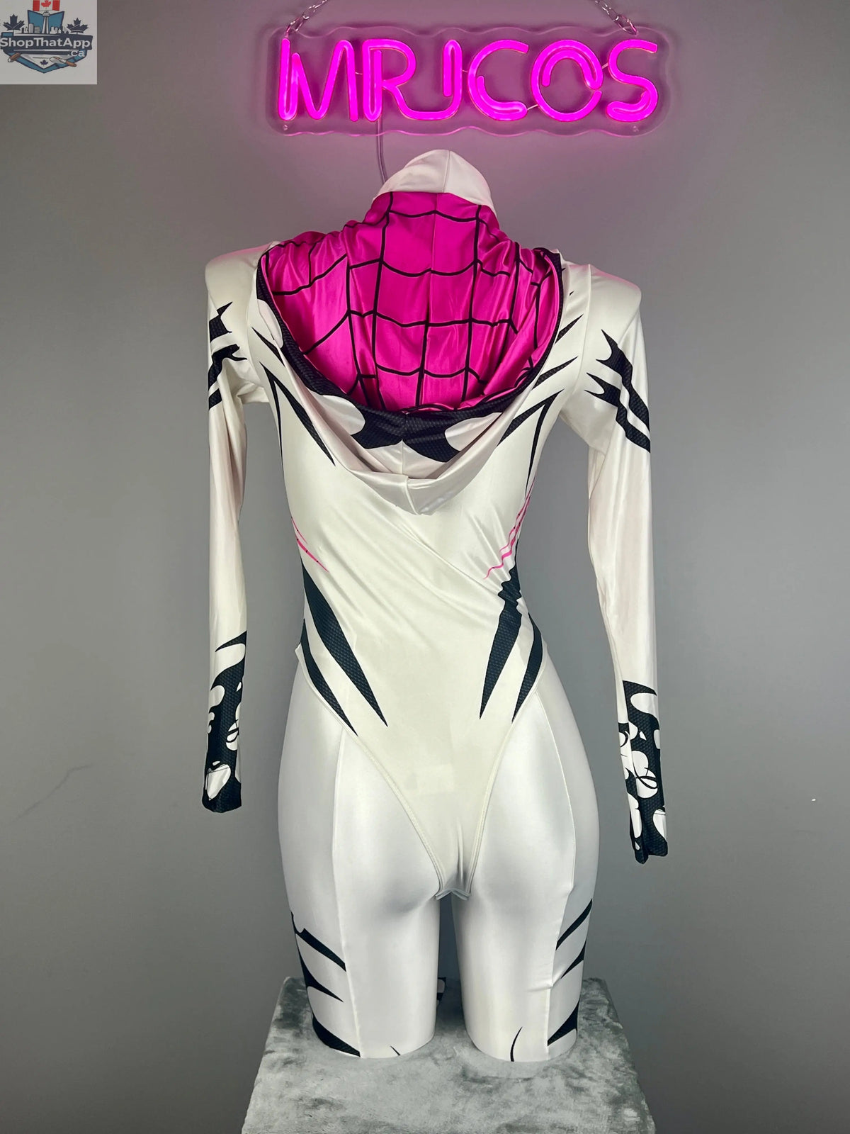 Woman wearing MRJCOS superhero bodysuit costume in spandex with open crotch design for cosplay or lingerie.