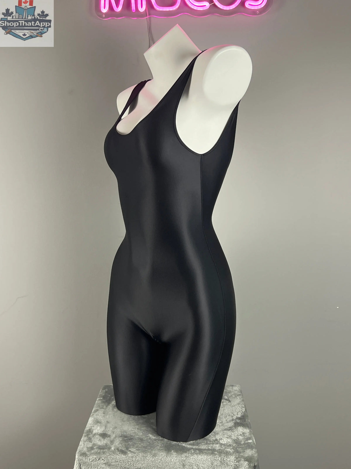 Glossy sleeveless sheer spandex bodysuit from MRJCOS, featuring silky fabric and fitted yoga or lingerie style dress.