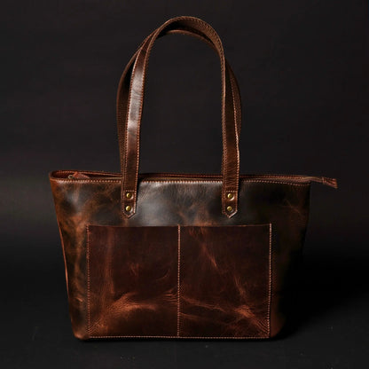 NAB Leather classic brown leather tote bag with sturdy handles and spacious interior, perfect for everyday use and versatile style.
