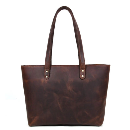 NAB Leather classic brown leather tote bag with sturdy handles and spacious interior, ideal for everyday style and versatile use.