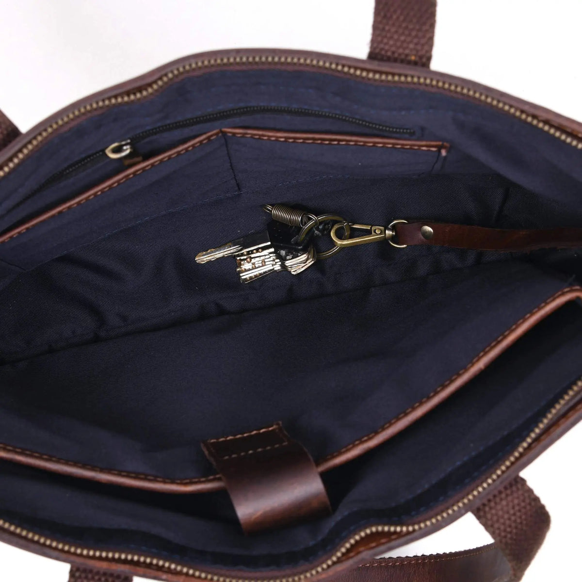NAB Leather classic brown leather tote bag with sturdy handles, perfect for everyday use and versatile style.