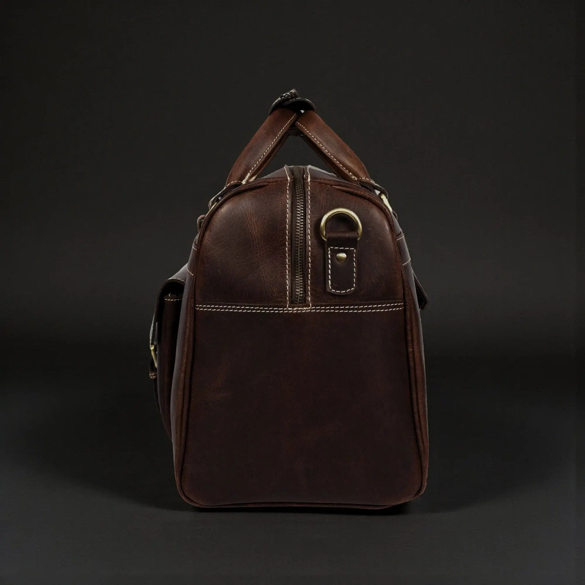 Brown distressed leather Voyager Duffle bag by NAB Leather, full-grain leather handbag with sturdy handles and spacious interior.