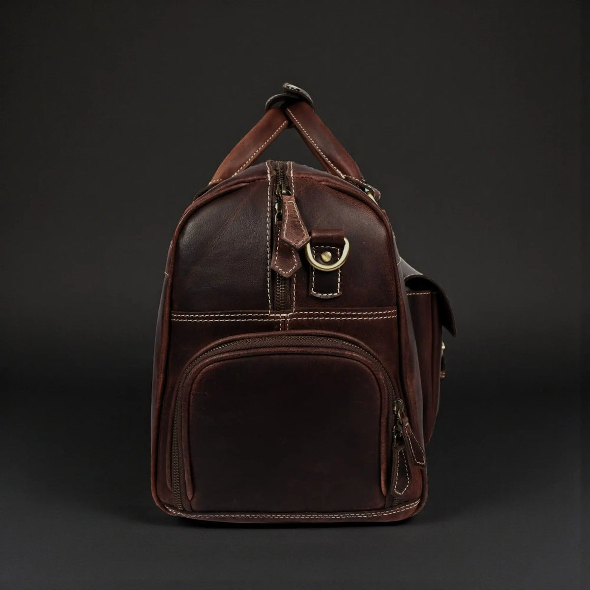 Brown leather Voyager Duffle bag by NAB Leather, full-grain distressed leather with sturdy handles and spacious design.
