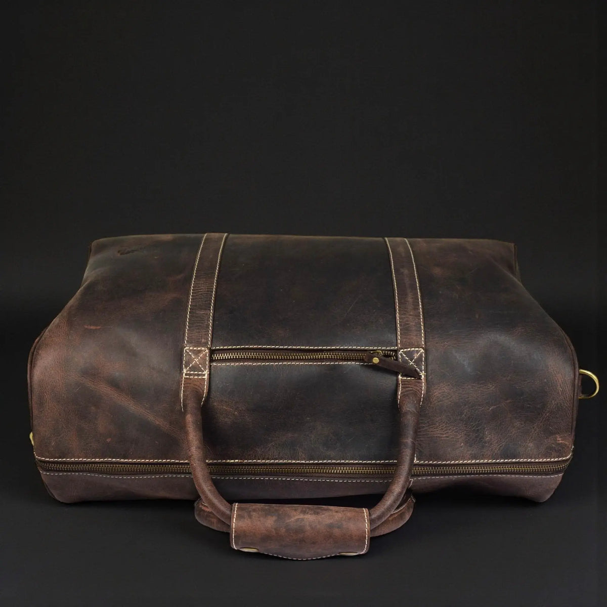 Brown leather Wayfarer Bag by NAB Leather, a classic full-grain leather duffle purse with sturdy handles and a spacious interior.