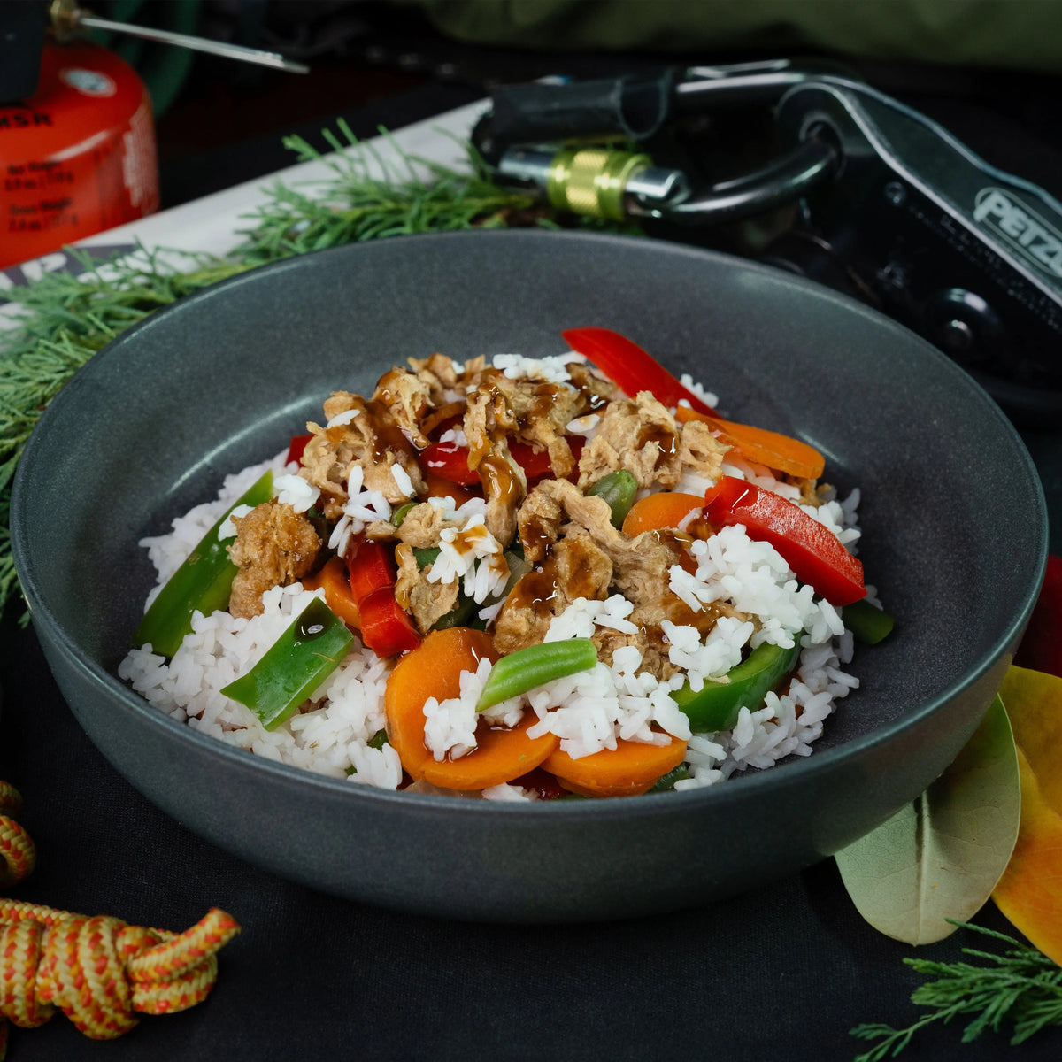 Nomad Nutrition Chick'n Teriyaki Bowl with rice, featuring plant-based vegan dehydrated chicken and flavorful teriyaki sauce.