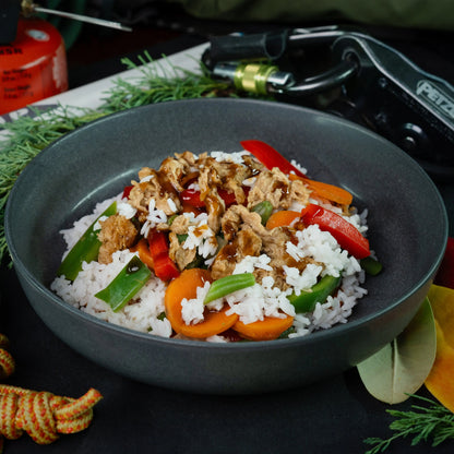 Nomad Nutrition Chick'n Teriyaki Bowl with rice, featuring plant-based vegan dehydrated chicken and flavorful teriyaki sauce.