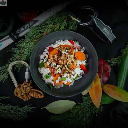 Nomad Nutrition Chick'n Teriyaki Bowl with chicken, rice, and vegetables in a food image.