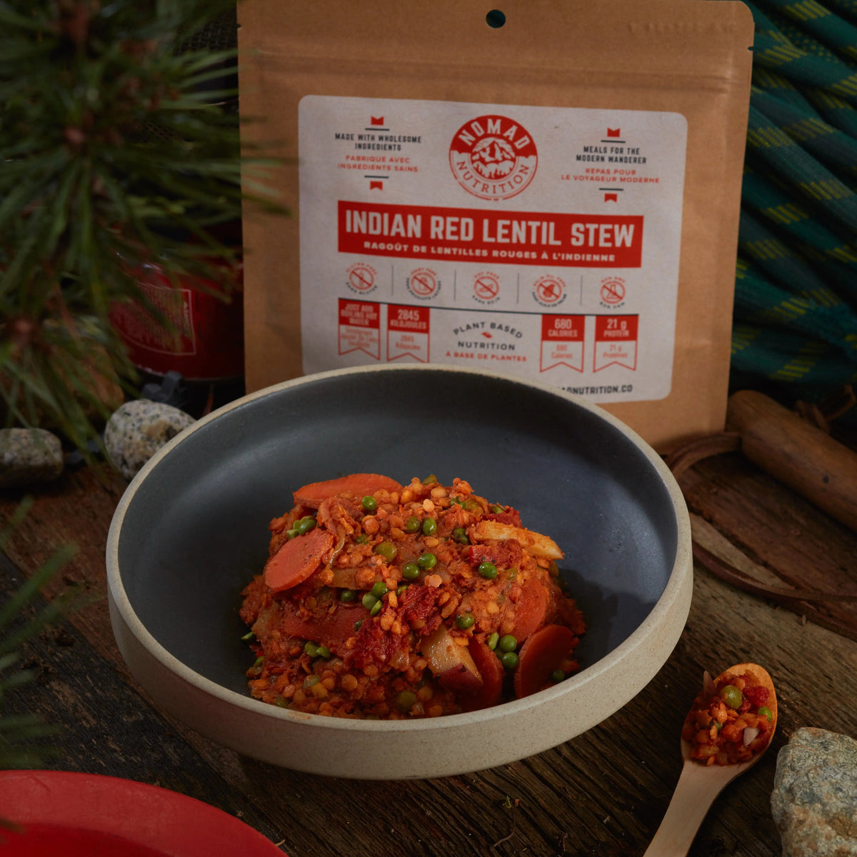 Nomad Nutrition Indian Red Lentil Stew in a bowl, showcasing a hearty, vegan, gluten-free plant-based meal with rich red lentil texture.