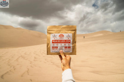 Dehydrated Indian red lentil stew by Nomad Nutrition, showcasing a hearty, plant-based, vegan, gluten-free meal in a bowl.
