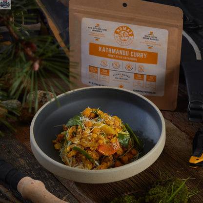 Vegan Kathmandu Curry Powder by Nomad Nutrition, displayed in a jar, showcasing vibrant, authentic spice blend for flavorful dishes.