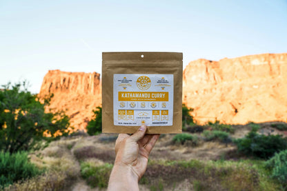 Nomad Nutrition Kathmandu Curry Powder in a jar, showcasing vibrant, aromatic spice blend for flavorful vegan and gluten-free dishes.