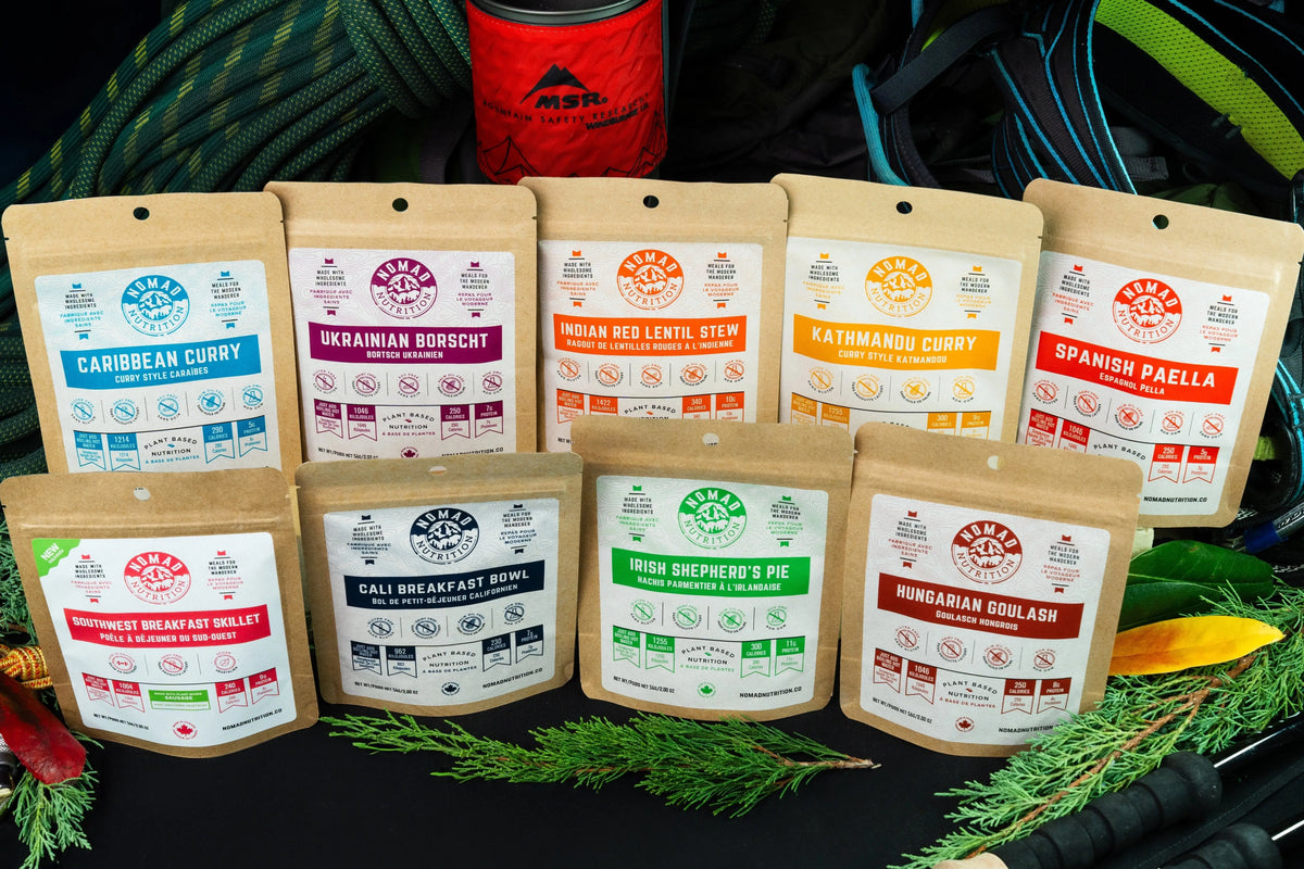 Nomad Nutrition sampler pack featuring plant-based, vegan, gluten-free dehydrated snack samples in an assortment pack.