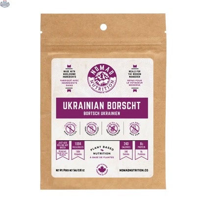 Dehydrated Ukrainian Borscht from Nomad Nutrition, vegan and gluten-free, served in a bowl with vibrant beetroot and vegetable ingredients.