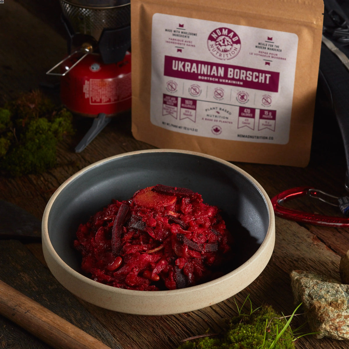 Dehydrated Ukrainian Borscht soup by Nomad Nutrition, showcasing vibrant beets, vegetables, and herbs in a plant-based vegan meal.