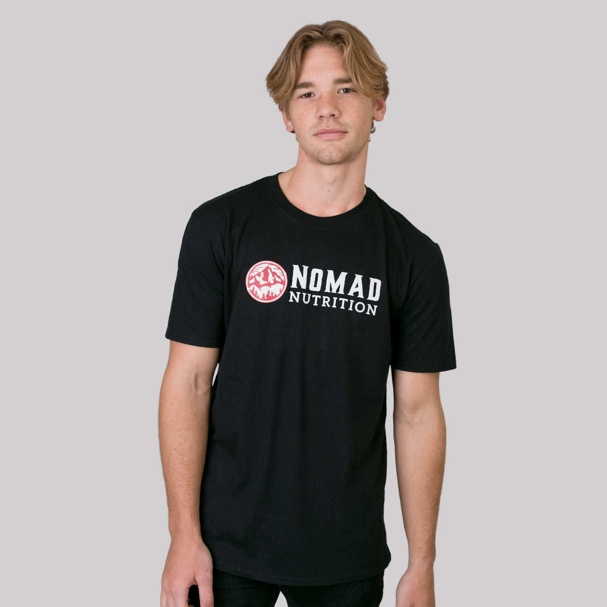 Nomad Nutrition Nomad Logo Tee, stylish vegan t-shirt with shadow logo, comfortable swag for adventurers.