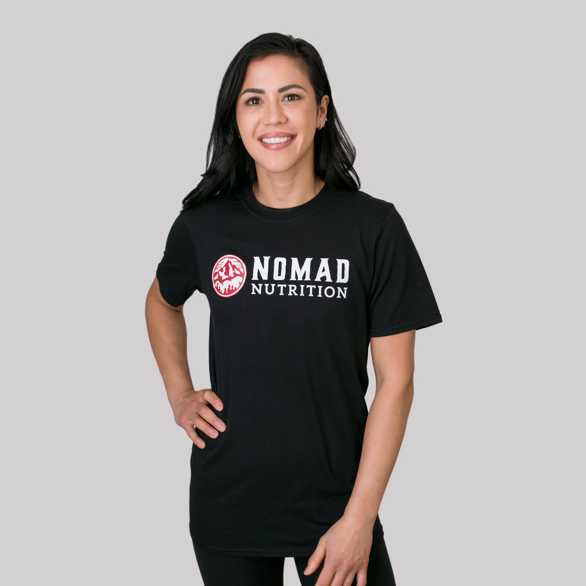 Nomad Nutrition Nomad Logo Tee, stylish black T-shirt with Nomad branding, suitable for adventurers and plant-based lifestyles.
