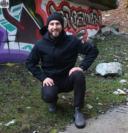 Northern Sun men's black softshell jacket showing a casual city lifestyle style with a sleek, versatile design.