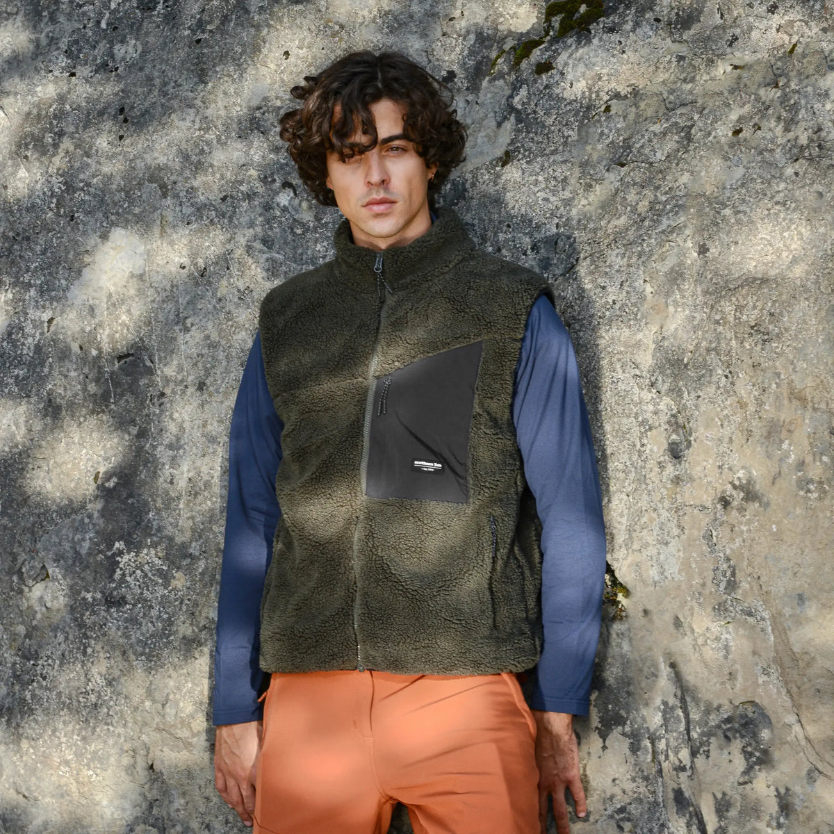Unisex Northern Sun Sherpa vest with a cozy, casual design, featuring a plush fleece exterior and warm collar.