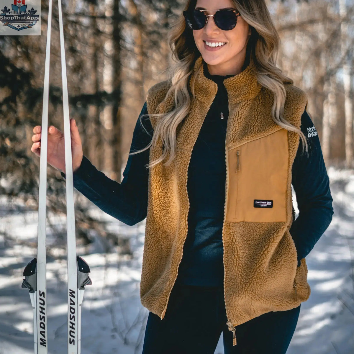 Unisex Northern Sun Sherpa vest with a cozy fleece exterior and quilted interior, perfect for casual outdoor wear.