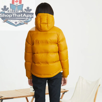 Northern Sun women's puffer down jacket with hood, showing the back view in a winter outdoor setting.