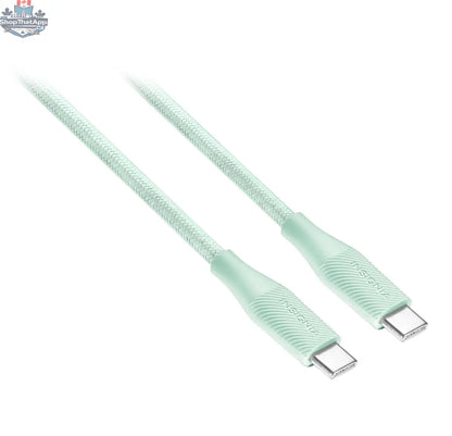 Insignia USB-C to USB-C 3m green charging cable for cell phones, shown in a natural scene with the cable coiled and ready to use.