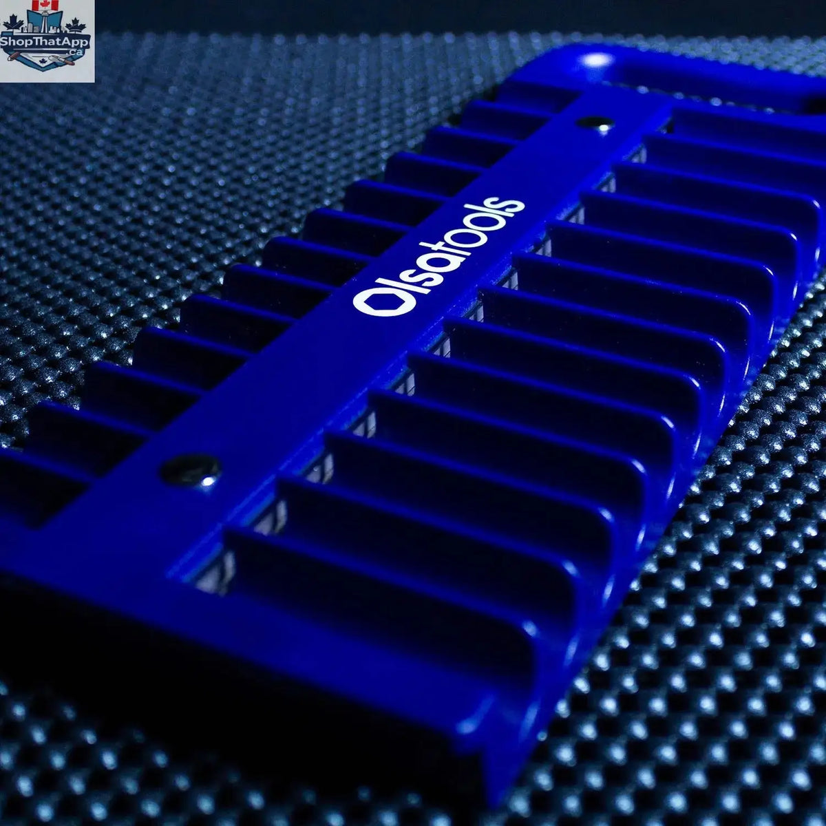 Olsa Tools Canada magnetic socket organizer tray holding metal sockets for organized, easy tool management in a workshop.