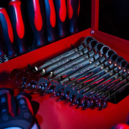 Olsa Tools Canada magnetic wrench organizer holding various wrenches in a garage setting for efficient tool storage.