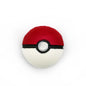 Red and white bath bomb shaped like a Pokéball with "Elemental Elixir Catch Sphere" branding, designed for relaxing baths.