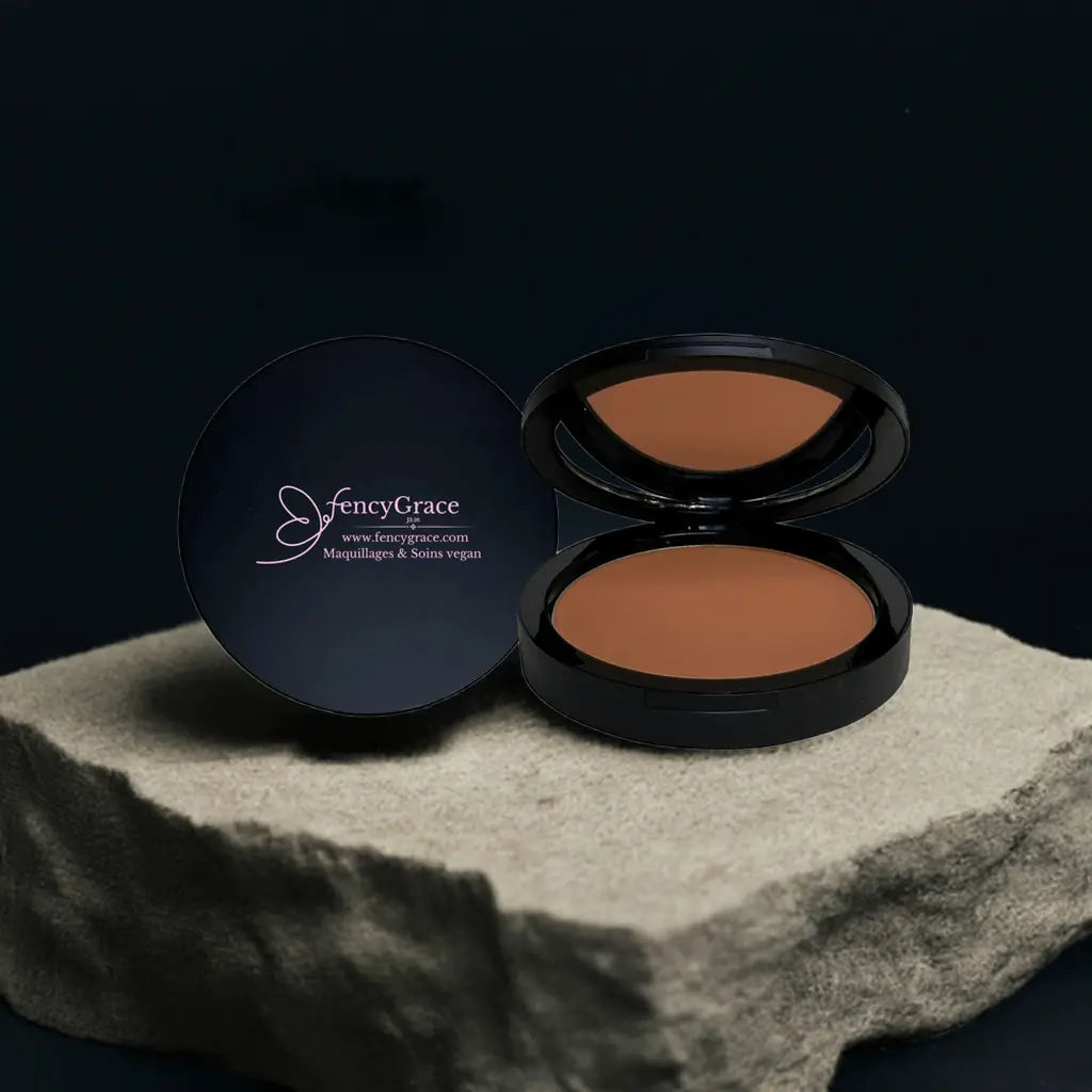 Vegan FencyGrace Anne 133 compact powder with natural finish, beige color, and sleek packaging for a smooth makeup look.